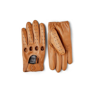 Hestra tan leather driving gloves with perforated fingers and knuckle cutouts