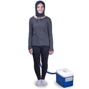 Person wearing a Polar Products cooling hood connected to a portable cooler