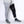 Polar Products black leg compression wrap on a person wearing grey sweatpants