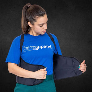 Person wearing a ThermApparel cooling vest over a blue t-shirt