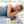 Person sleeping under a heated blanket with ETL UL and Oeko-Tex certification logos and product feature list