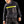 Man wearing a Miracool cooling vest over a black sweatshirt and work trousers