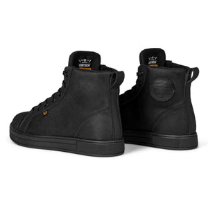 Pair of black Cortech high top motorcycle sneakers