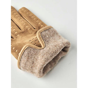 Tan suede gloves with perforated details and a knitted wool cuff