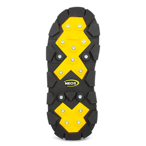 Neos boot sole with yellow traction pads and metal studs