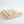 Folded beige fleece blanket with satin trim