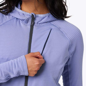 Close up of a light purple hooded jacket with a vertical chest zipper pocket
