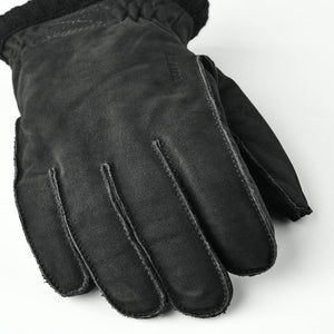 Black Hestra leather glove with ribbed cuff