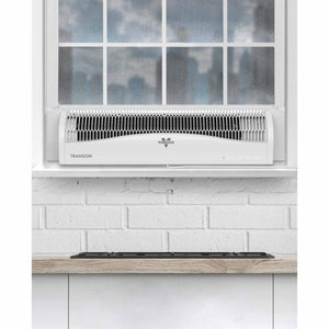 Vornado Transom window fan installed on a white windowsill