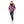 Woman wearing a purple Gobi Heat hooded puffer jacket with jeans and white sneakers