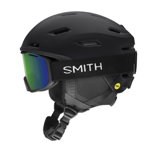 Smith matte black ski helmet with green tinted goggles and Mips safety technology