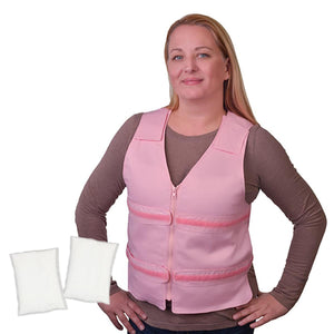 Woman wearing a pink Polar Products cooling vest with two white cooling packs displayed in front