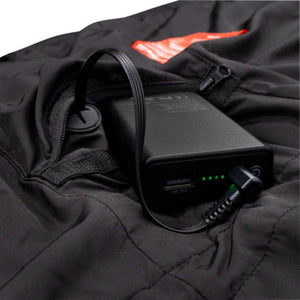 Radians black power bank connected to a cable inside a garment pocket