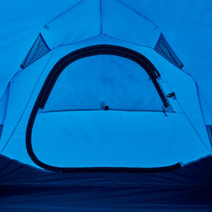Interior view of a blue Black Diamond tent with a zippered door