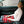 Zone Tech red plaid heated car blanket on lap of passenger in car