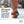 K1 Series ice traction cleats with 10 tungsten carbide spikes on a boot walking on snow