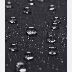 Water droplets on black waterproof fabric