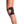 Black hinged knee brace worn on a leg