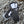 Aheata black and white heated mittens on snowy ground