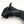 Hand wearing a black Seirus glove holding a black pen