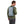 Man wearing a light blue Thule hydration backpack