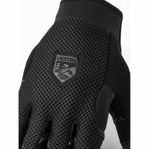 Black Hestra glove with mesh back and brand logo patch