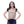Woman wearing a tan tactical vest over a black shirt