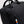 Got Bag black backpack with water droplets on the surface and a zippered pocket