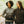 Two women wearing ActionHeat heated jackets and a hand warmer pouch while walking outdoors