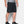 Under Armour black athletic shorts on a person