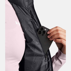 Under Armour vest with internal zippered chest pocket holding a smartphone