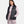 Woman wearing a black Under Armour puffer vest over a light pink long sleeve top