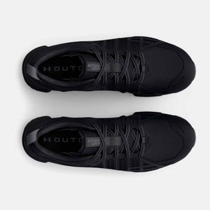 Top view of black Under Armour athletic sneakers