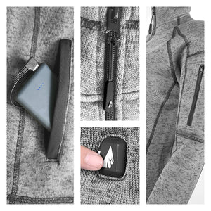 Close up details of a grey heated jacket showing battery pocket zipper and power control button