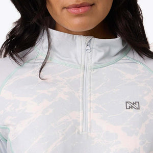 Mobile Warming light blue quarter zip top with marble pattern and mint green stitching