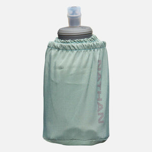 Nathan soft flask water bottle with sage green fabric sleeve
