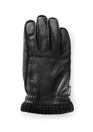Black Hestra leather glove with a ribbed knit cuff