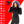 Woman wearing ActionHeat black hooded jacket with feature list including 4 zone heating and 10000 mAh power bank