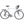 Silver touring bicycle with front and rear racks and drop handlebars
