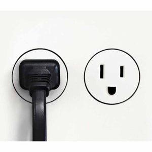 Vornado power cord plugged into a wall outlet