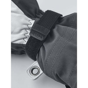 Hestra glove wrist strap with velcro closure and logo tab