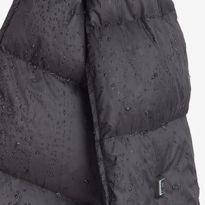 Water droplets on black Venture Heat quilted fabric