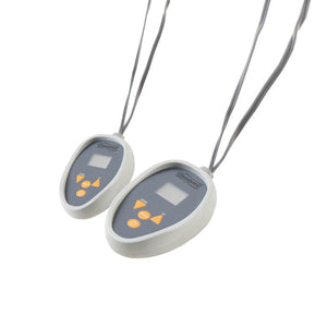 Two Beautyrest wired remote controls with digital displays and orange buttons