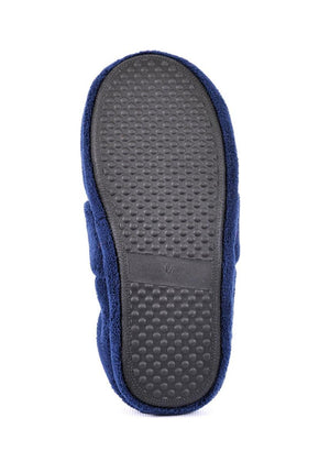Bottom view of a navy blue slipper with a textured rubber grip sole