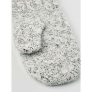 Close up of a grey and white speckled wool mitten