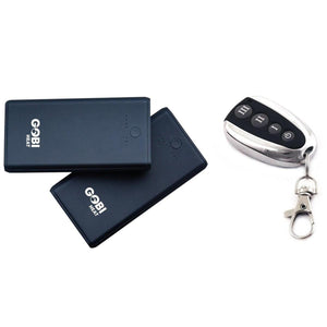 Two Gobi Heat battery packs and a remote control key fob