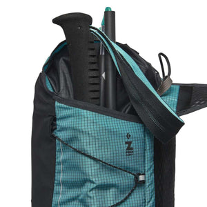 Black Diamond backpack featuring an external Z-pole carry system with trekking poles inserted