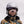 Person wearing a white Smith Optics helmet and mirrored ski goggles
