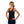 Woman wearing a black DonJoy back support brace over a black tank top