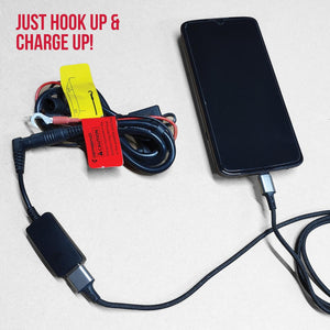 Gerbing battery charging cable connected to a smartphone
